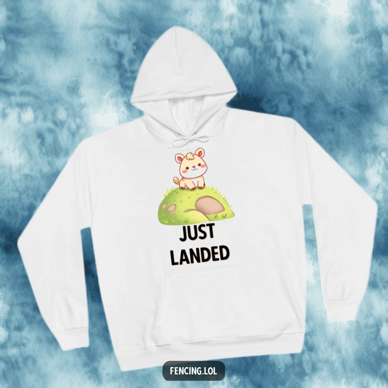 Funny hoodie design featuring a content animal making a soft, graceful landing on a lush grassy hill, spreading warmth.
