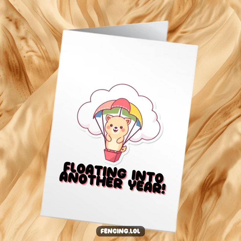 Funny Free Printable Birthday Card: A happy animal rides a cloud with a colorful parachute, a playful DIY gift.